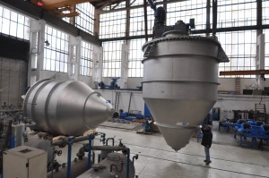 Vertical Bulks solids mixers with a helix in an overhung position are reach 
