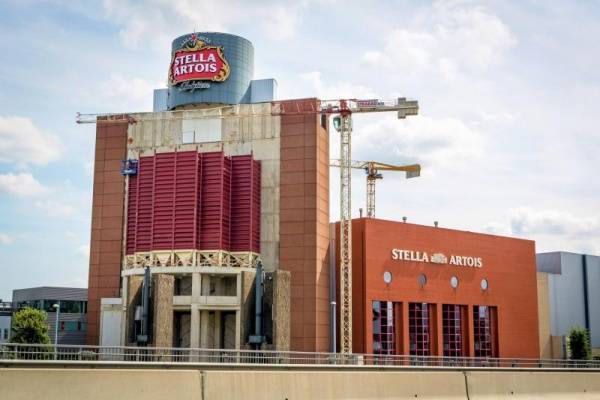 Clever expansion for flagship brewery Stella Artois Square silos for raw materials on a prominent place